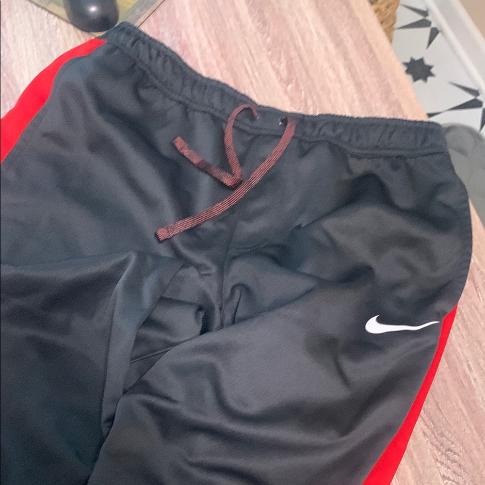 Nike Black and Red Joggers with Performance Fabric